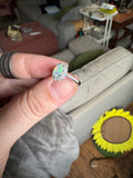 White Fire Oval Opal in Sterling with White Topaz Accents Ring